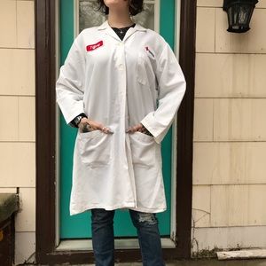 Large lab coat closet with name tag